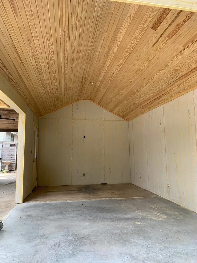 Raw unstained tongue and groove wood ceiling